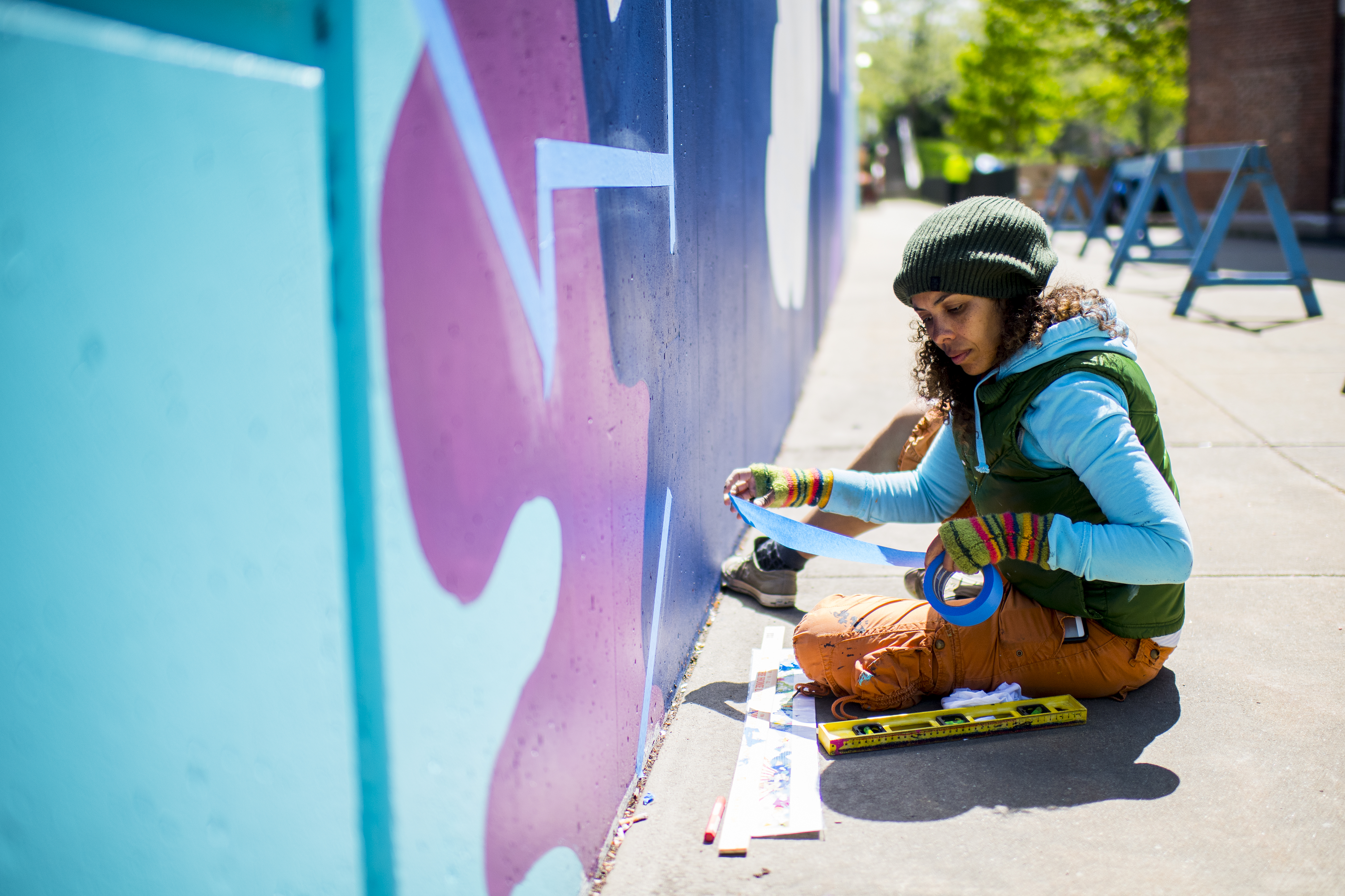 Artist with mural