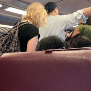 Commuters exiting commuter train.