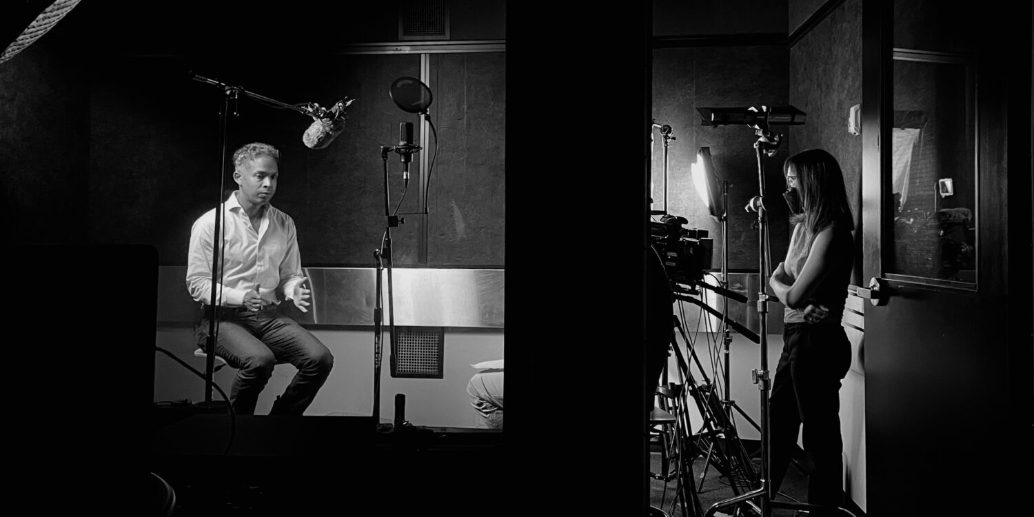 A black and white photo of the production of "The Enigma of Harold Sonny Ladoo."