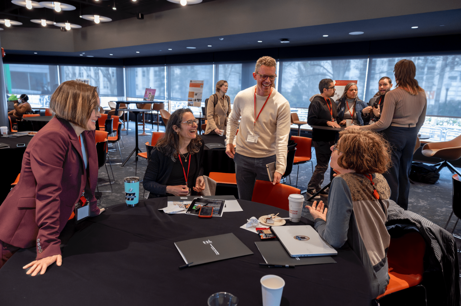 A group of smiling faculty at the CTM launch event, "media in motion," in March 2025.