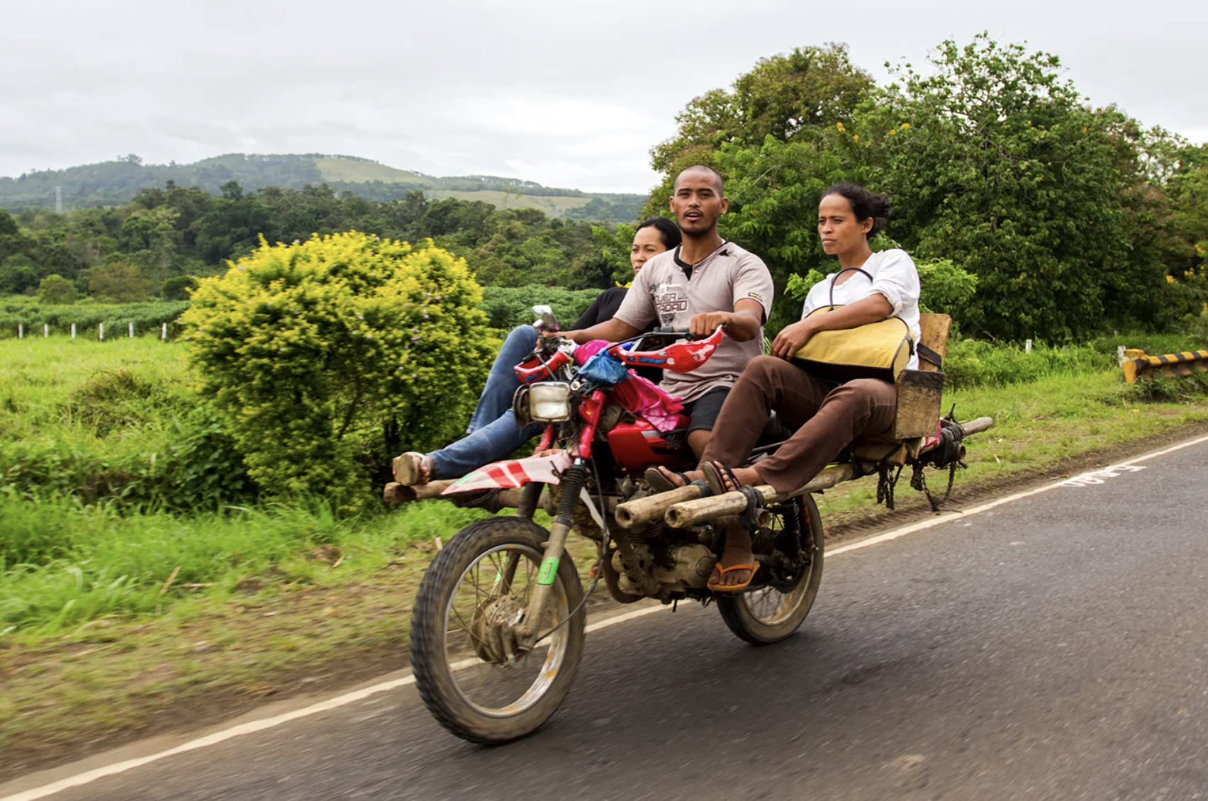 Photo shows the habal-habal, a kind of modified motorcycle in the Philippines designed to accomodate more people.