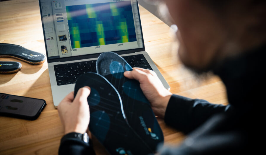 01/30/26 - BOSTON, MA. - Kristian Kloeckl, an associate professor in the department of Art and Design, and co-op Catherine Zhou, a data analysis and data visualization student, collect data from walking using the StappOne textile insole sensors on Friday, Jan. 30, 2026 in Ryder Hall. Photo by Alyssa Stone/Northeastern University