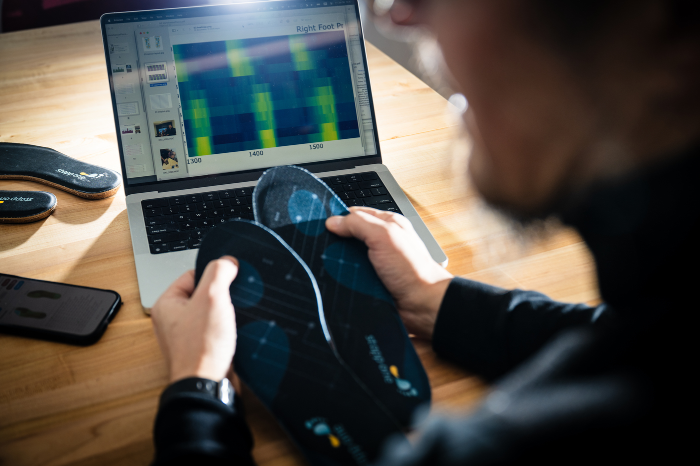 01/30/26 - BOSTON, MA. - Kristian Kloeckl, an associate professor in the department of Art and Design, and co-op Catherine Zhou, a data analysis and data visualization student, collect data from walking using the StappOne textile insole sensors on Friday, Jan. 30, 2026 in Ryder Hall. Photo by Alyssa Stone/Northeastern University